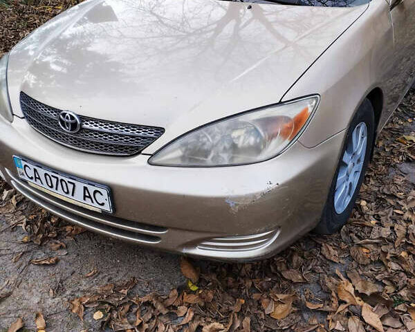 Бежевий Тойота Камрі, об'ємом двигуна 2.4 л та пробігом 290 тис. км за 5800 $, фото 1 на Automoto.ua