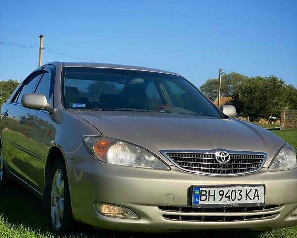 Бежевий Тойота Камрі, об'ємом двигуна 2.36 л та пробігом 231 тис. км за 6300 $, фото 1 на Automoto.ua