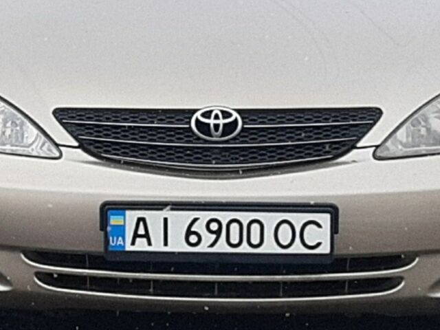 Бежевый Тойота Камри, объемом двигателя 2.4 л и пробегом 230 тыс. км за 5500 $, фото 1 на Automoto.ua