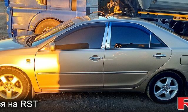 Бежевый Тойота Камри, объемом двигателя 2.4 л и пробегом 266 тыс. км за 5500 $, фото 1 на Automoto.ua