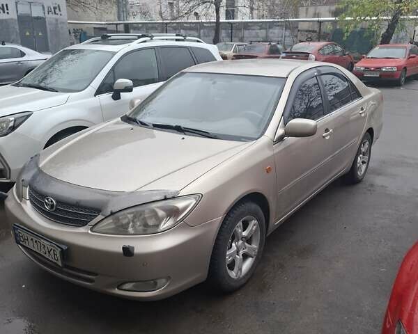 Бежевый Тойота Камри, объемом двигателя 2.4 л и пробегом 250 тыс. км за 8900 $, фото 1 на Automoto.ua