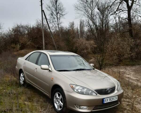 Бежевий Тойота Камрі, об'ємом двигуна 2.4 л та пробігом 299 тис. км за 6400 $, фото 1 на Automoto.ua