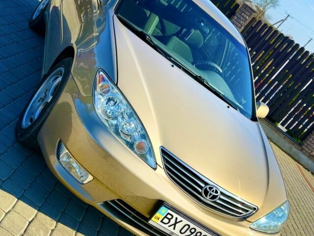 Бежевий Тойота Камрі, об'ємом двигуна 2.4 л та пробігом 122 тис. км за 5999 $, фото 1 на Automoto.ua