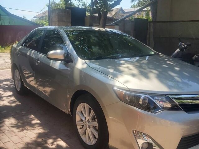 Бежевий Тойота Камрі, об'ємом двигуна 2.5 л та пробігом 127 тис. км за 15500 $, фото 1 на Automoto.ua