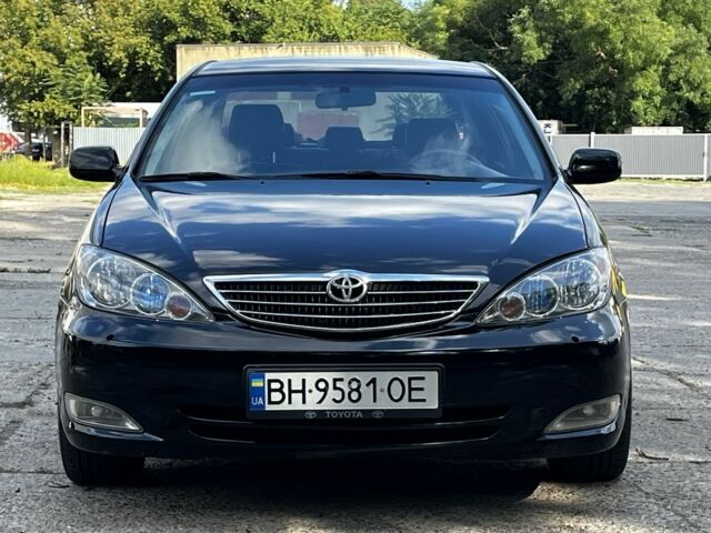 Черный Тойота Камри, объемом двигателя 3 л и пробегом 330 тыс. км за 5800 $, фото 1 на Automoto.ua