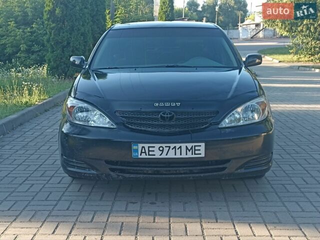 Черный Тойота Камри, объемом двигателя 2.36 л и пробегом 403 тыс. км за 3150 $, фото 1 на Automoto.ua