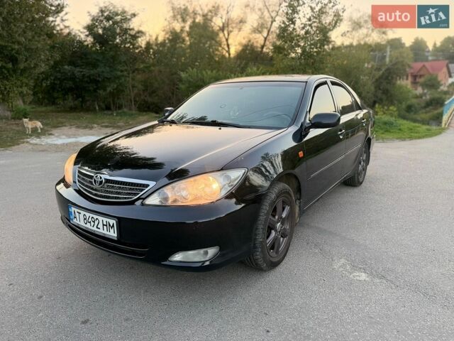 Чорний Тойота Камрі, об'ємом двигуна 3 л та пробігом 335 тис. км за 5500 $, фото 1 на Automoto.ua