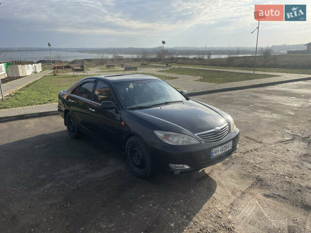 Чорний Тойота Камрі, об'ємом двигуна 2.36 л та пробігом 270 тис. км за 2900 $, фото 1 на Automoto.ua
