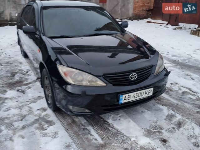 Черный Тойота Камри, объемом двигателя 3 л и пробегом 370 тыс. км за 6000 $, фото 1 на Automoto.ua
