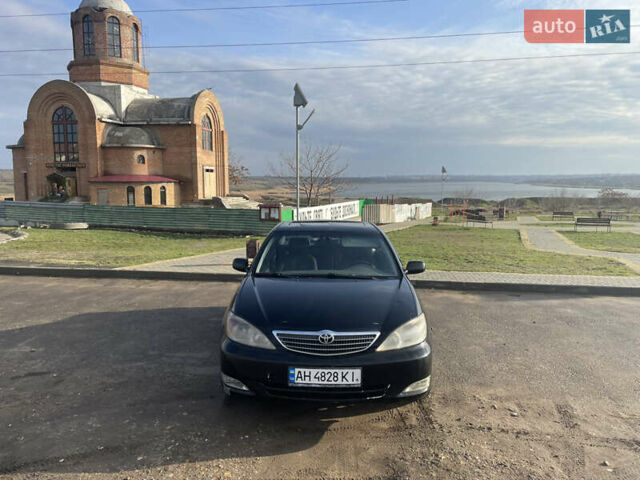 Чорний Тойота Камрі, об'ємом двигуна 2.36 л та пробігом 270 тис. км за 2900 $, фото 1 на Automoto.ua