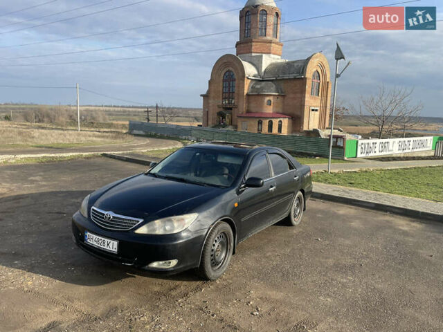 Черный Тойота Камри, объемом двигателя 2.36 л и пробегом 270 тыс. км за 2900 $, фото 1 на Automoto.ua