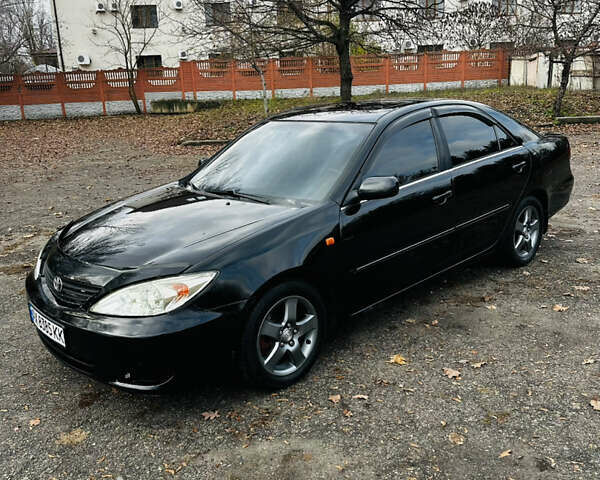 Черный Тойота Камри, объемом двигателя 3 л и пробегом 301 тыс. км за 4500 $, фото 1 на Automoto.ua