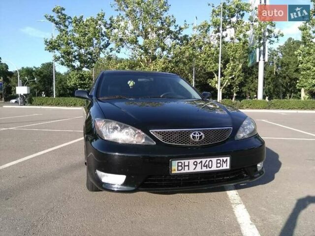 Черный Тойота Камри, объемом двигателя 2.36 л и пробегом 390 тыс. км за 6800 $, фото 1 на Automoto.ua