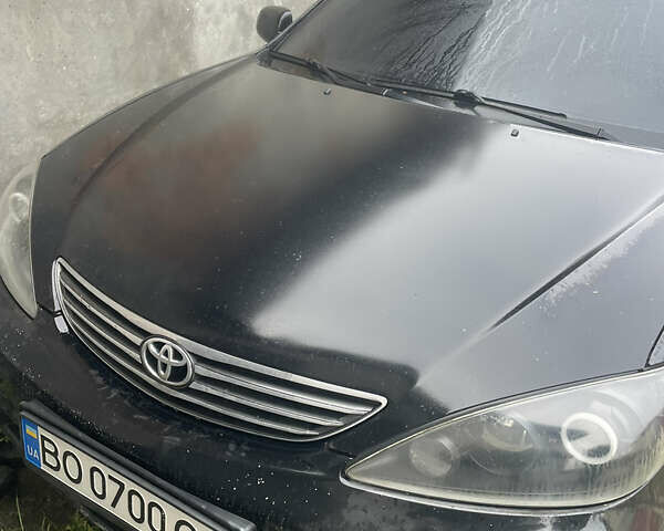 Черный Тойота Камри, объемом двигателя 3 л и пробегом 200 тыс. км за 5800 $, фото 1 на Automoto.ua