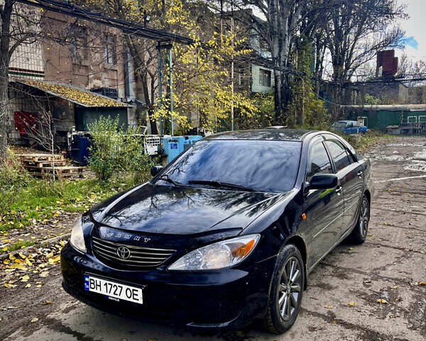 Черный Тойота Камри, объемом двигателя 3 л и пробегом 340 тыс. км за 6700 $, фото 1 на Automoto.ua