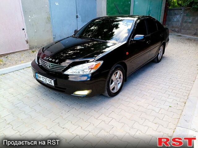 Черный Тойота Камри, объемом двигателя 3 л и пробегом 344 тыс. км за 6300 $, фото 1 на Automoto.ua