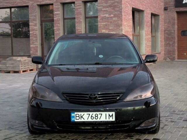 Чорний Тойота Камрі, об'ємом двигуна 3 л та пробігом 500 тис. км за 4600 $, фото 1 на Automoto.ua