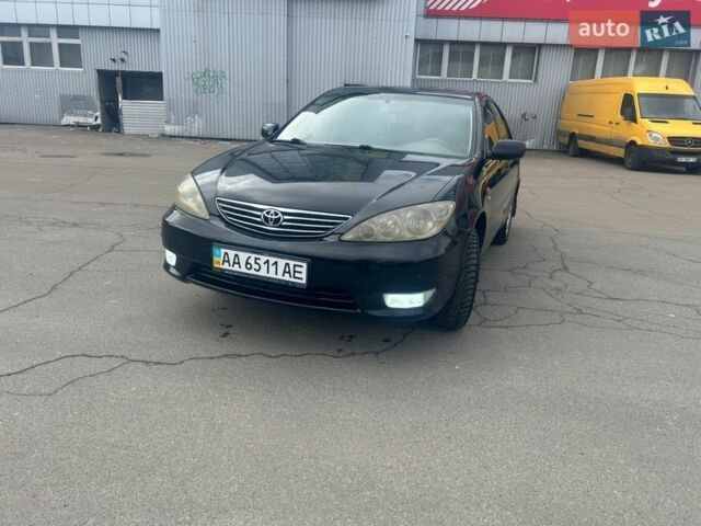 Черный Тойота Камри, объемом двигателя 2.36 л и пробегом 406 тыс. км за 5500 $, фото 1 на Automoto.ua
