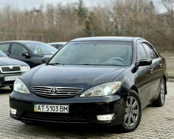 Чорний Тойота Камрі, об'ємом двигуна 3 л та пробігом 203 тис. км за 3999 $, фото 1 на Automoto.ua