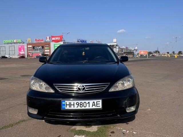 Черный Тойота Камри, объемом двигателя 3 л и пробегом 285 тыс. км за 5100 $, фото 1 на Automoto.ua