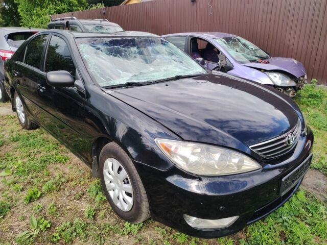 Черный Тойота Камри, объемом двигателя 2.4 л и пробегом 220 тыс. км за 2650 $, фото 1 на Automoto.ua