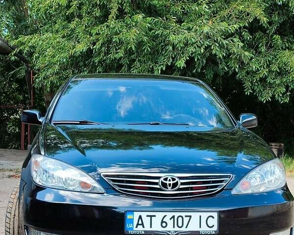 Чорний Тойота Камрі, об'ємом двигуна 3 л та пробігом 347 тис. км за 7500 $, фото 1 на Automoto.ua