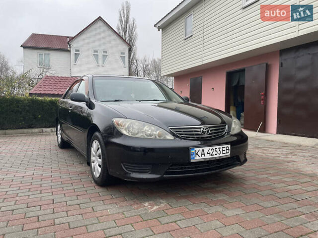 Черный Тойота Камри, объемом двигателя 2.36 л и пробегом 189 тыс. км за 5200 $, фото 1 на Automoto.ua