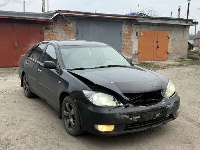 Черный Тойота Камри, объемом двигателя 3 л и пробегом 300 тыс. км за 2999 $, фото 1 на Automoto.ua
