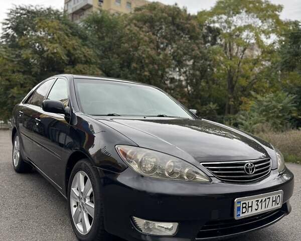 Чорний Тойота Камрі, об'ємом двигуна 2.36 л та пробігом 180 тис. км за 6000 $, фото 1 на Automoto.ua