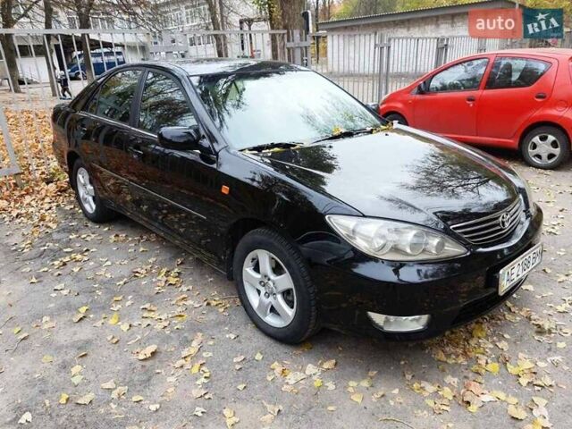 Чорний Тойота Камрі, об'ємом двигуна 3 л та пробігом 218 тис. км за 6400 $, фото 1 на Automoto.ua