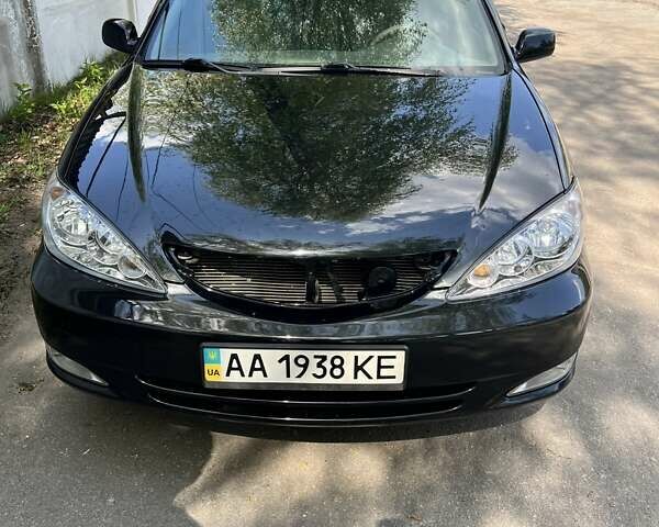 Черный Тойота Камри, объемом двигателя 3 л и пробегом 315 тыс. км за 5700 $, фото 1 на Automoto.ua