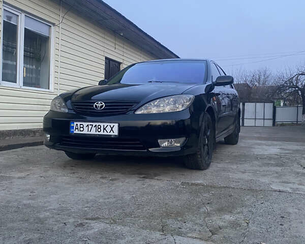Черный Тойота Камри, объемом двигателя 2.36 л и пробегом 360 тыс. км за 7500 $, фото 1 на Automoto.ua