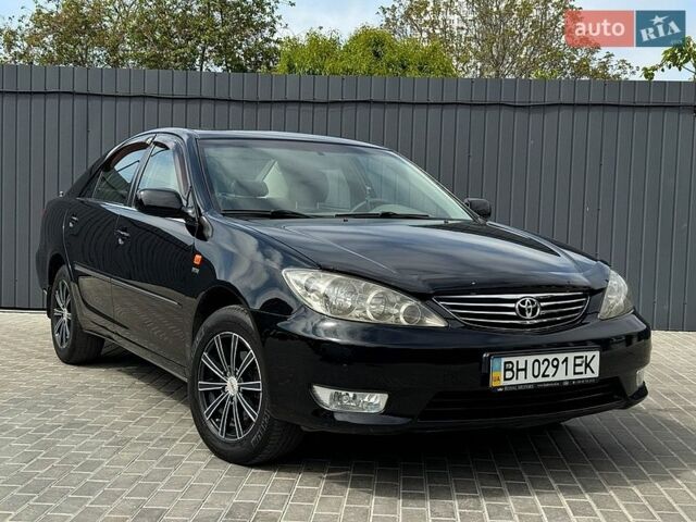 Черный Тойота Камри, объемом двигателя 2.36 л и пробегом 132 тыс. км за 8700 $, фото 1 на Automoto.ua