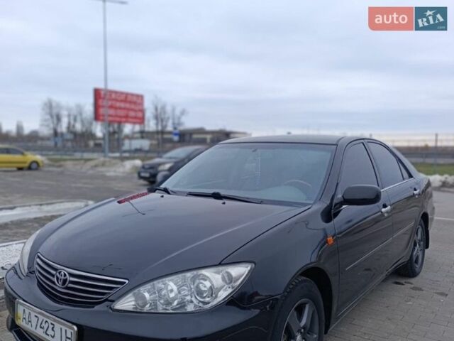 Черный Тойота Камри, объемом двигателя 3 л и пробегом 610 тыс. км за 5800 $, фото 1 на Automoto.ua