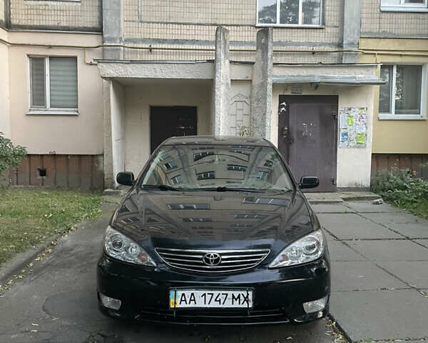 Чорний Тойота Камрі, об'ємом двигуна 3 л та пробігом 409 тис. км за 6000 $, фото 1 на Automoto.ua