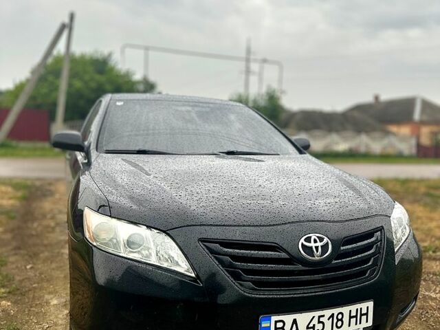 Чорний Тойота Камрі, об'ємом двигуна 2.4 л та пробігом 380 тис. км за 7499 $, фото 1 на Automoto.ua
