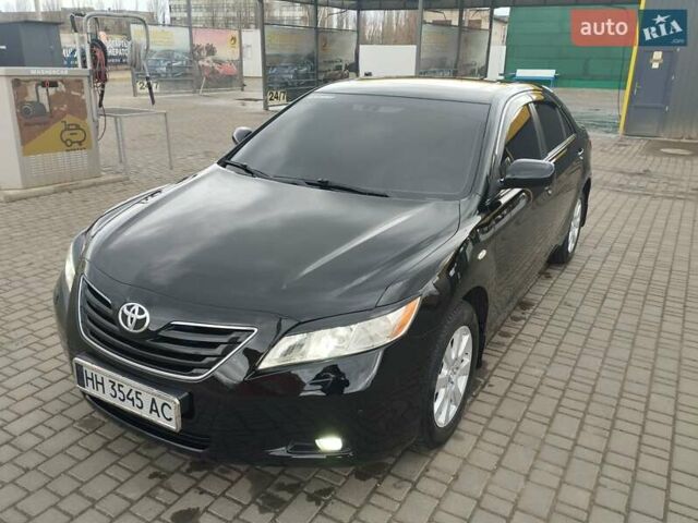 Черный Тойота Камри, объемом двигателя 2.4 л и пробегом 190 тыс. км за 11500 $, фото 1 на Automoto.ua