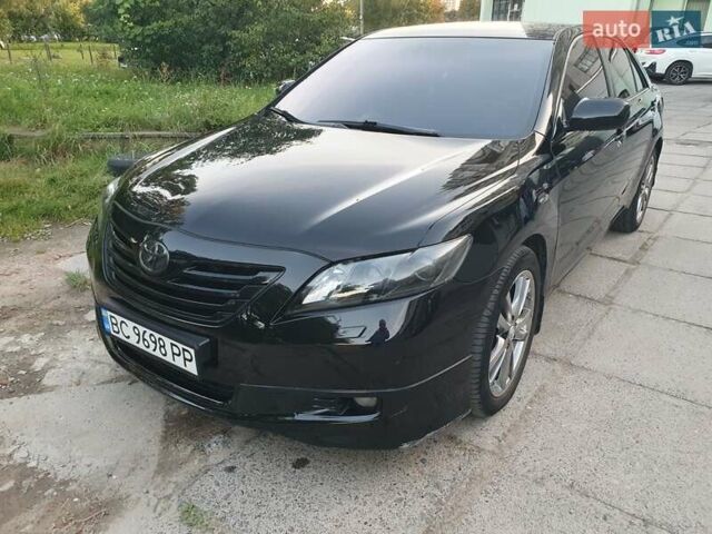 Черный Тойота Камри, объемом двигателя 3.46 л и пробегом 263 тыс. км за 13999 $, фото 1 на Automoto.ua