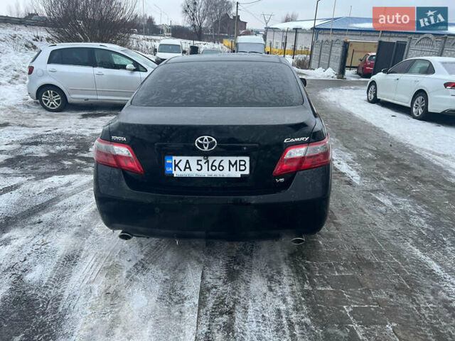 Черный Тойота Камри, объемом двигателя 3.46 л и пробегом 275 тыс. км за 7700 $, фото 1 на Automoto.ua