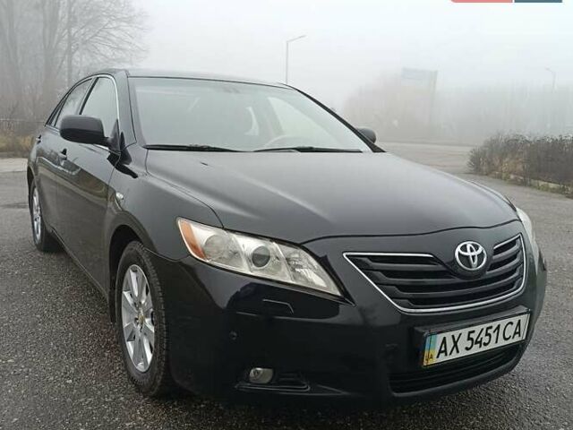 Черный Тойота Камри, объемом двигателя 3.46 л и пробегом 169 тыс. км за 10300 $, фото 1 на Automoto.ua