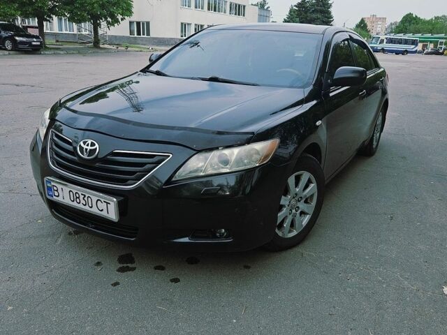 Чорний Тойота Камрі, об'ємом двигуна 2.36 л та пробігом 251 тис. км за 8000 $, фото 1 на Automoto.ua