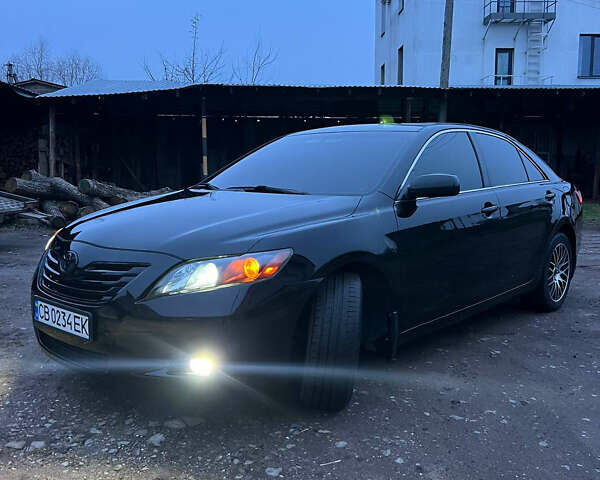 Черный Тойота Камри, объемом двигателя 3.46 л и пробегом 264 тыс. км за 9800 $, фото 1 на Automoto.ua