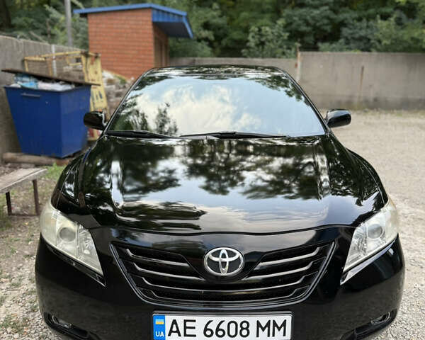 Черный Тойота Камри, объемом двигателя 2.36 л и пробегом 300 тыс. км за 7600 $, фото 1 на Automoto.ua