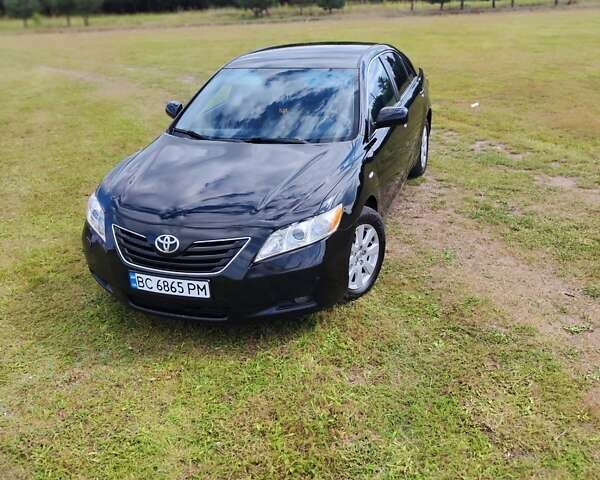 Черный Тойота Камри, объемом двигателя 2.4 л и пробегом 363 тыс. км за 7800 $, фото 1 на Automoto.ua