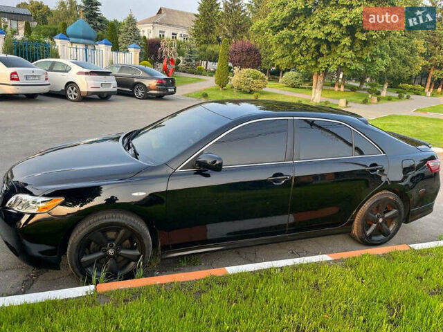 Черный Тойота Камри, объемом двигателя 3.46 л и пробегом 385 тыс. км за 8500 $, фото 1 на Automoto.ua
