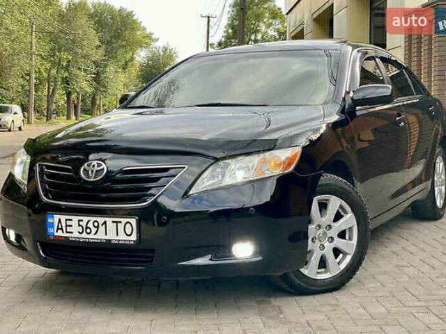 Чорний Тойота Камрі, об'ємом двигуна 3.5 л та пробігом 245 тис. км за 10500 $, фото 1 на Automoto.ua