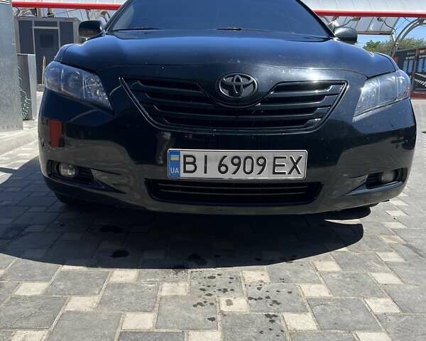 Черный Тойота Камри, объемом двигателя 3.5 л и пробегом 272 тыс. км за 8500 $, фото 1 на Automoto.ua