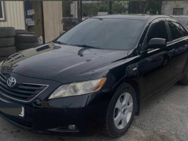 Черный Тойота Камри, объемом двигателя 3.5 л и пробегом 286 тыс. км за 7200 $, фото 1 на Automoto.ua