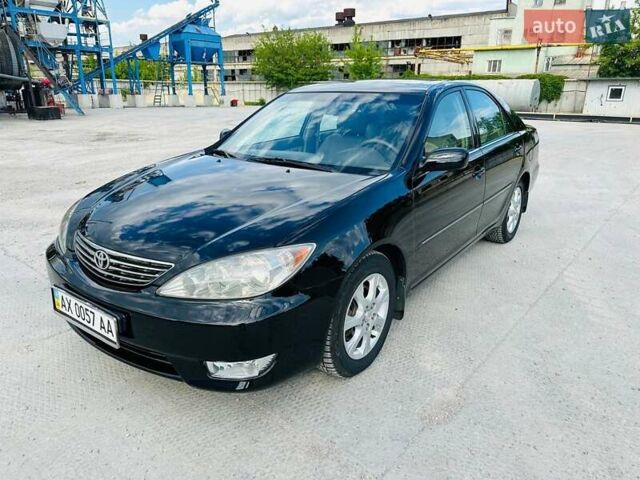 Черный Тойота Камри, объемом двигателя 3 л и пробегом 195 тыс. км за 6900 $, фото 1 на Automoto.ua