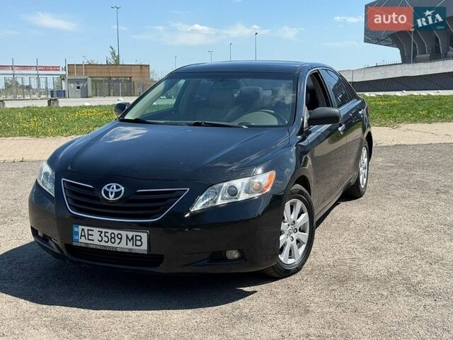 Черный Тойота Камри, объемом двигателя 2.36 л и пробегом 252 тыс. км за 6650 $, фото 1 на Automoto.ua